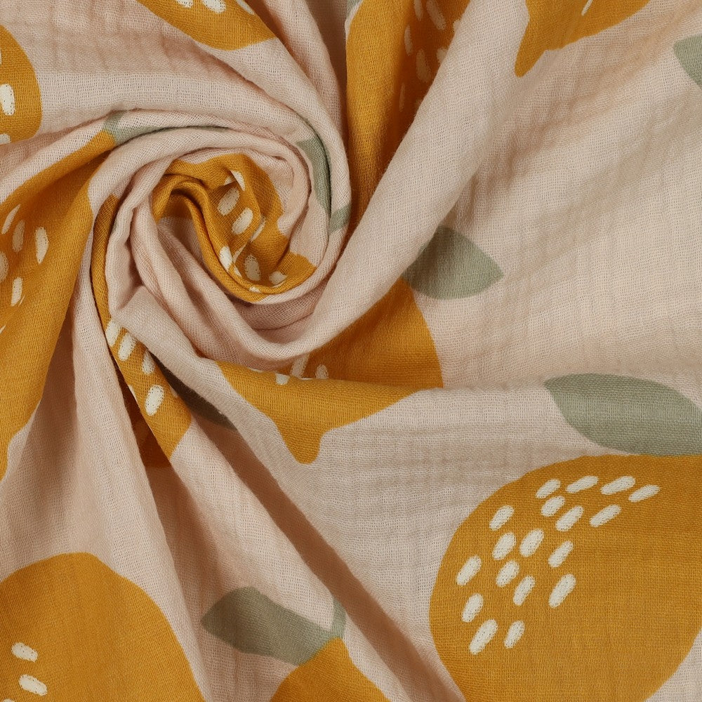 Weicher Baumwoll-Musselin mit sonnigem Zitronenprint auf naturfarbenem Hintergrund – ideal für sommerliche Kleidung und Babyprojekte.