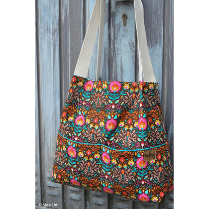 Robuster Baumwoll-Canvas mit buntem Folk-Blumenmuster im Retro- und Boho-Stil auf dunklem Hintergrund – ideal für Taschen, Dekorationen und kreative Nähprojekte.