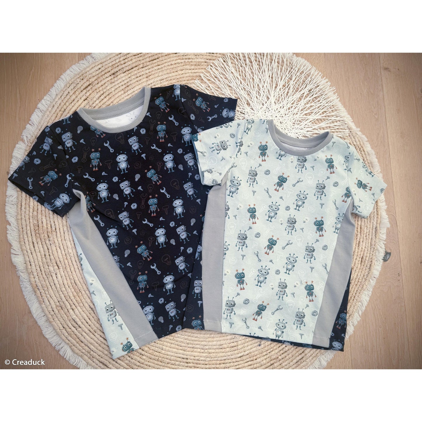 Hellblauer Baumwolljersey mit niedlichen Robotern, Werkzeugen und Technik-Motiven – Design „Hello Robot“ von Mrs. Mint Design für Swafing
