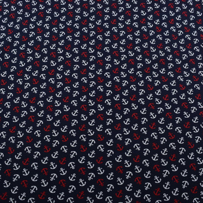 Dunkelblauer Baumwolljersey mit roten und weißen Ankern im maritimen Design.