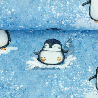 Eisblauer Sweatstoff mit niedlichen Pinguinen und Schneemotiv, 95 % Baumwolle und 5 % Elasthan, 295 g/m², 150 cm breit