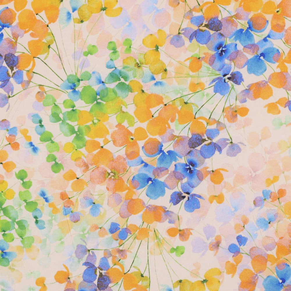 Leichte Radiance Viskose mit farbenfrohem Blätter-Digitalprint in Blau, Gelb, Grün und Apricot – ideal für sommerliche Kleidung.