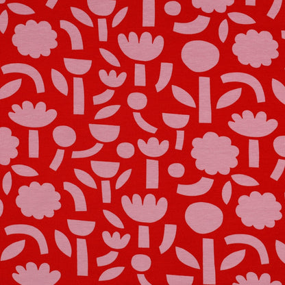 Grafischer Jersey Stoff mit rosa Blumen auf rotem Hintergrund im Retro Design von Jennifer Bouron, GOTS Baumwolle elastisch
