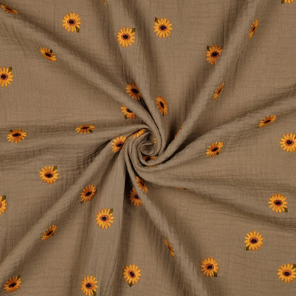 Musselin mit gestickten Sonnenblumen